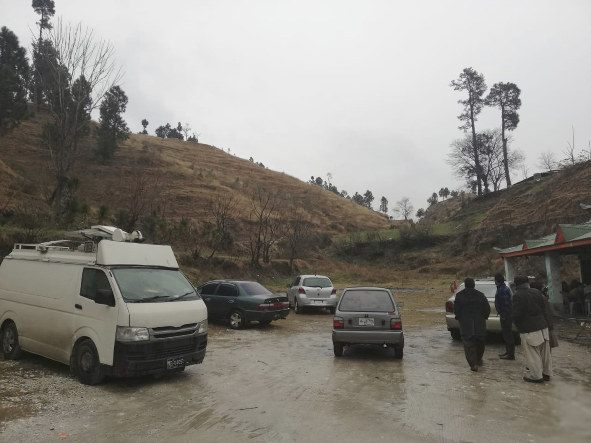 Pakistani reporters wait for permission from authorities to visit the area of the Indian airstrike in Jaba, near Balakot, on February 26.