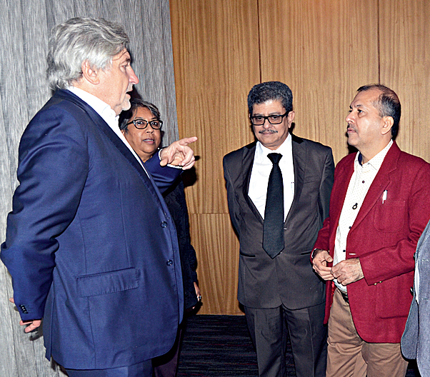 Vladimir Grigoriev, deputy director of the Federal Agency for Press and Mass Media of the Russian Federation, with Book Fair organisers Raju Barman (right) and Tridib Chatterjee, joint secretary and president respectively of the Publishers and Booksellers Guild, and Sujata Sen, director of the Kolkata Literature Festival