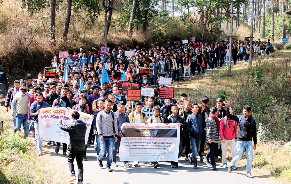North Eastern Hill University Students Union activists take out a rally on the campus on Wednesday