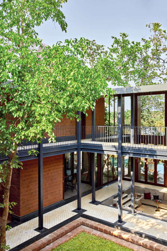 Glass villa by Tahiliani Homes.