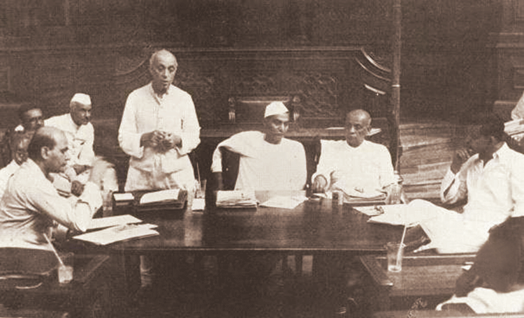 Jawaharlal Nehru addresses a meeting of a committee of the Constituent Assembly with Rajendra Prasad and Vallabhbhai Patel in attendance in 1949