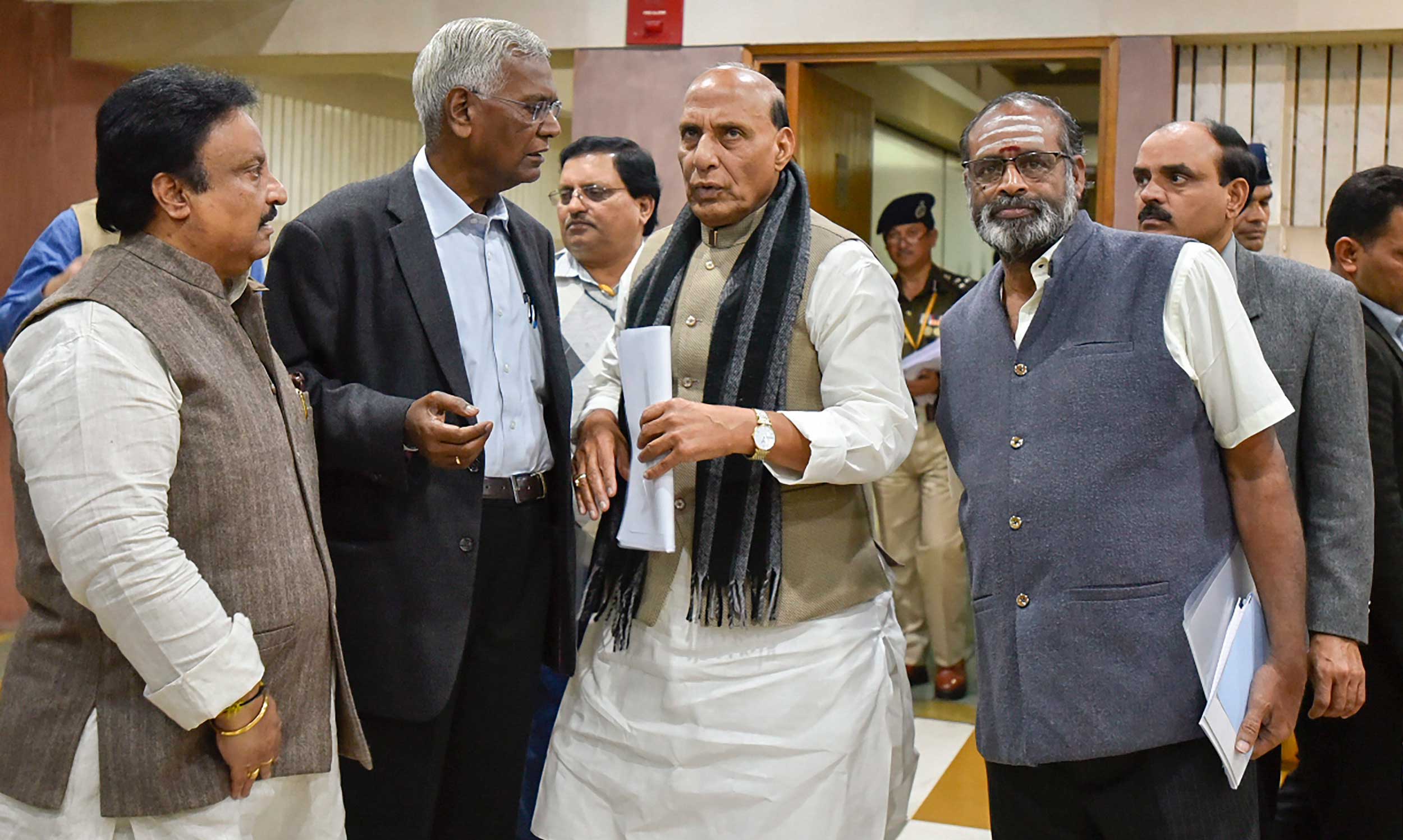 Home minister Rajnath Singh and CPI leader D. Raja after attending an all-party meeting on the Pulwama terror attack, at Parliament Library building, in New Delhi, on Saturday.  