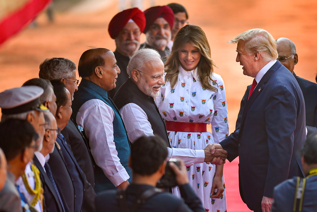US President Donald Trump shakes hands with Prime Minister Narendra Modi during the ceremonial reception, at Rashtrapati Bhawan, in New Delhi