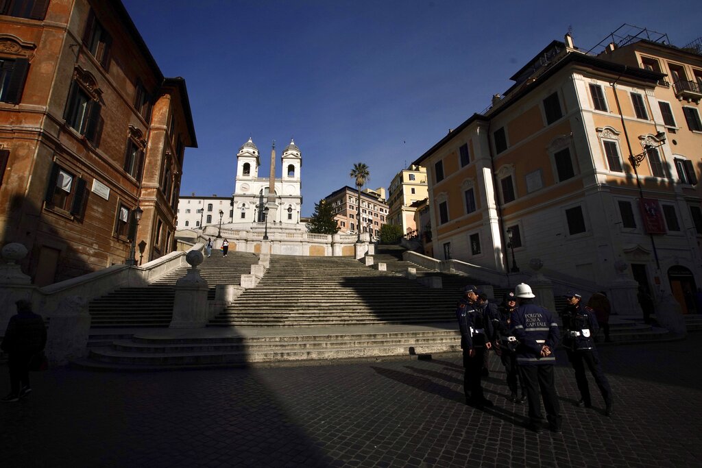 Italian municipality police stand by empty Spanish Steps in Rome on Tuesday