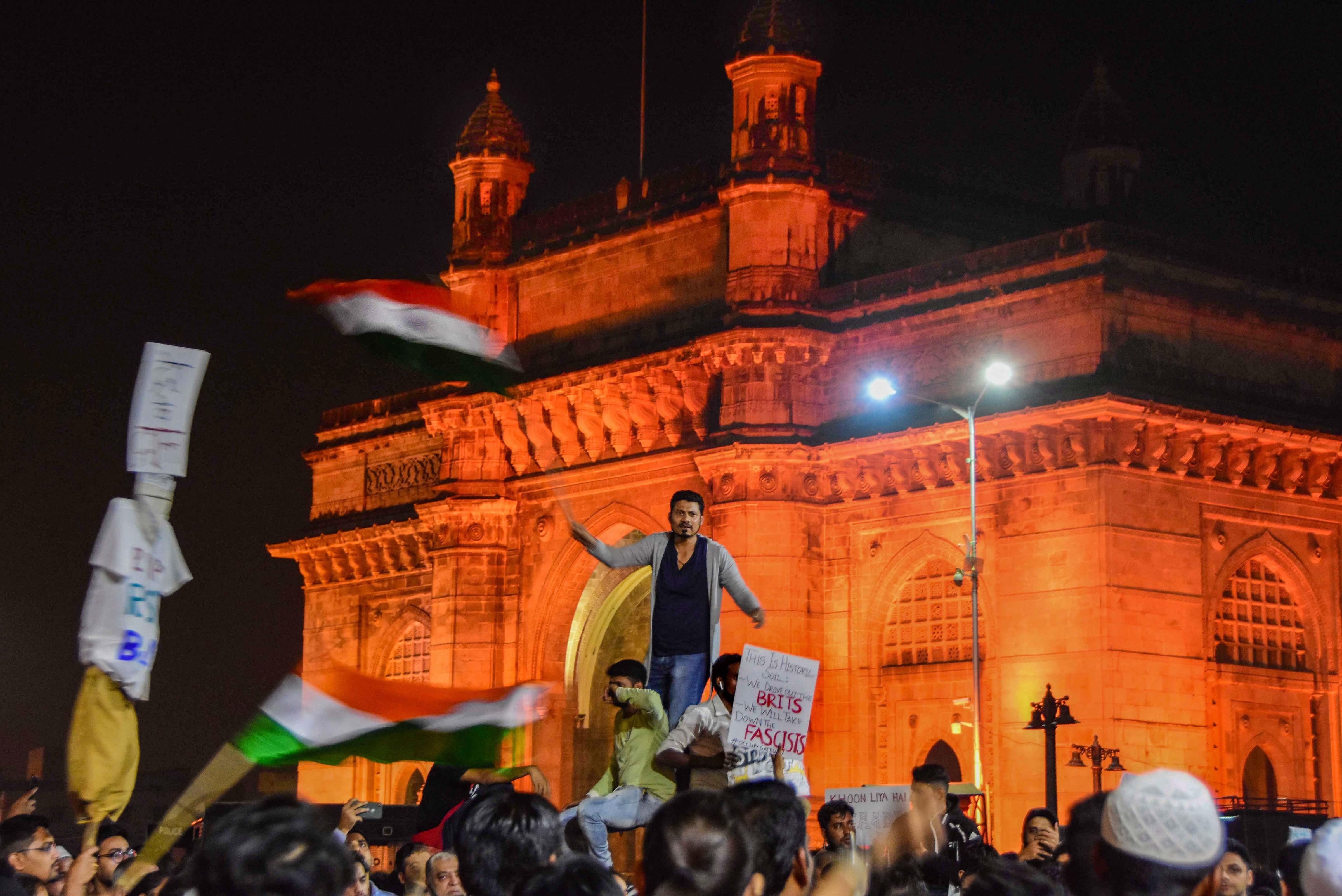 Students on the second of their protest at the Gateway of India to condemn Sunday's attack on the students of JNU, in Mumbai, early Tuesday, January 7, 2020. 