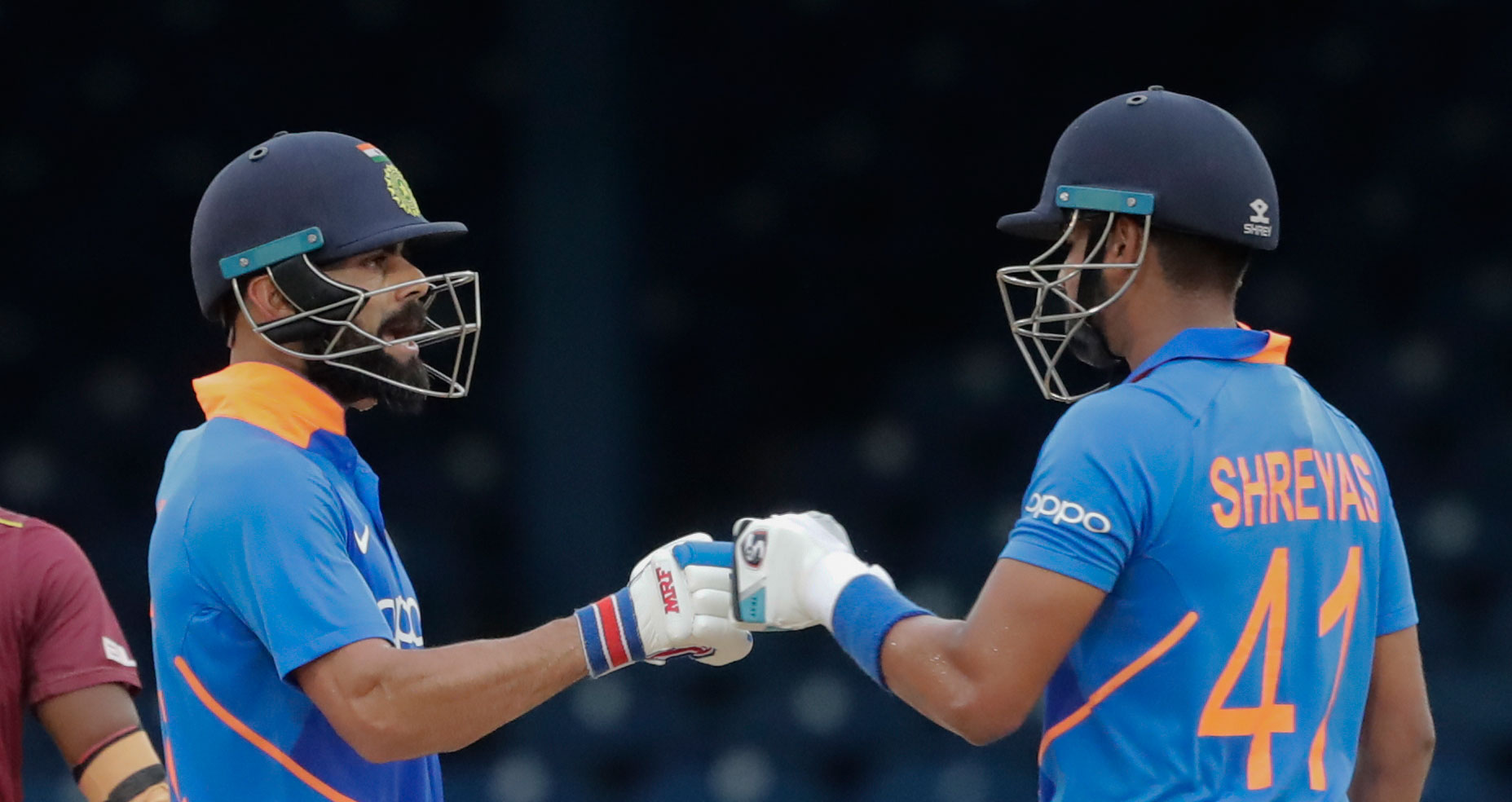 Virat Kohli with Shreyas Iyer during their third One-Day International cricket match against West Indies in Port of Spain, Trinidad, on August 14, 2019.
