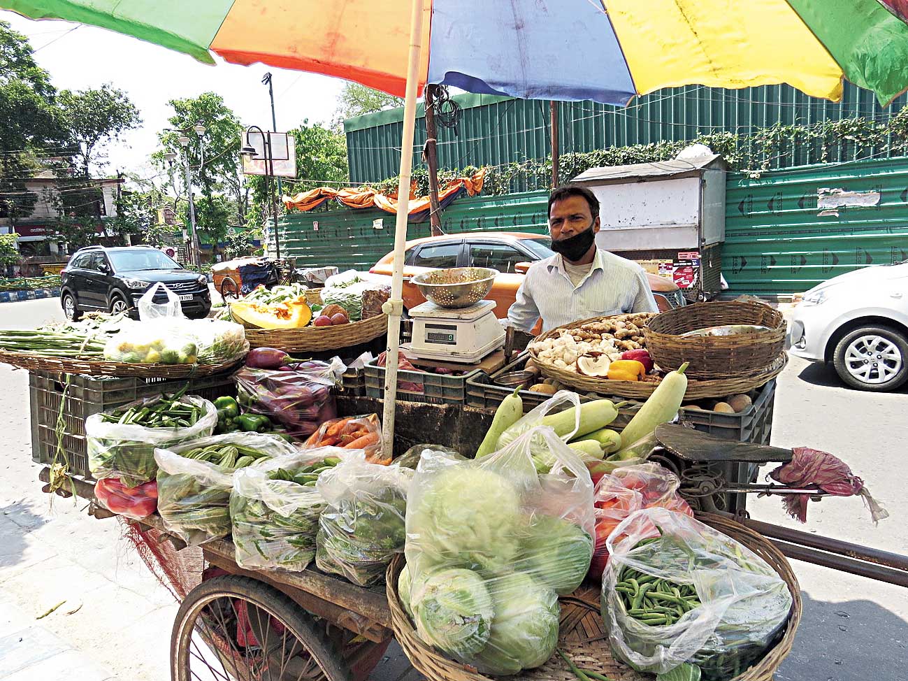 Madhab Malo with his vegetable cart in HB Block