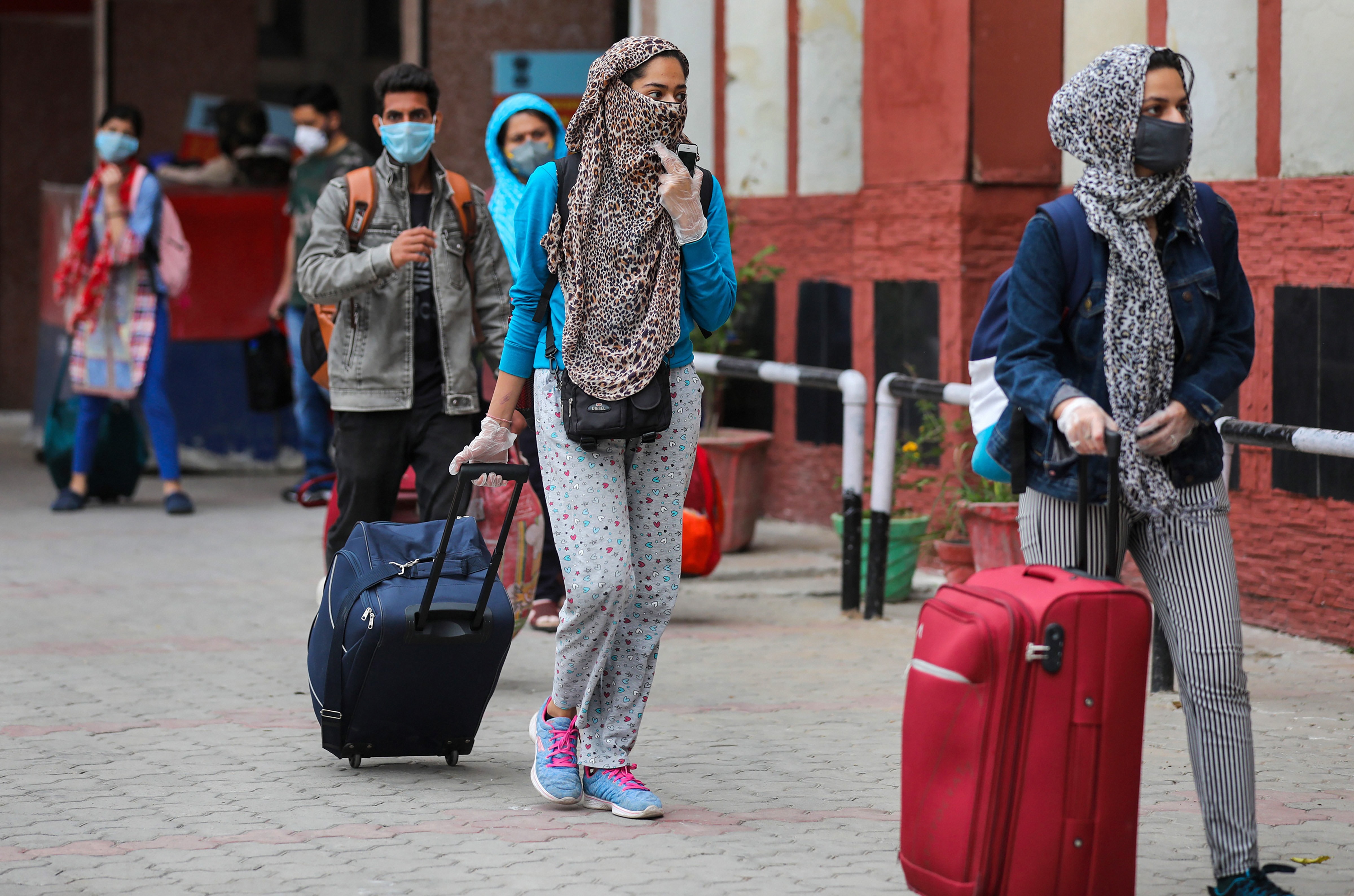 Jammu: Passengers from Delhi arrive at Jammu Tawi railway station following the resumption of passenger train services by Indian Railways connecting major cities, during the ongoing nationwide COVID-19 lockdown, in Jammu, Thursday, May 14, 2020.