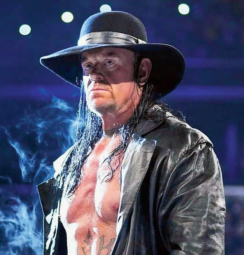 The Undertaker chokeslams Edge off a ladder through the ring: SummerSlam  2008 | WWE