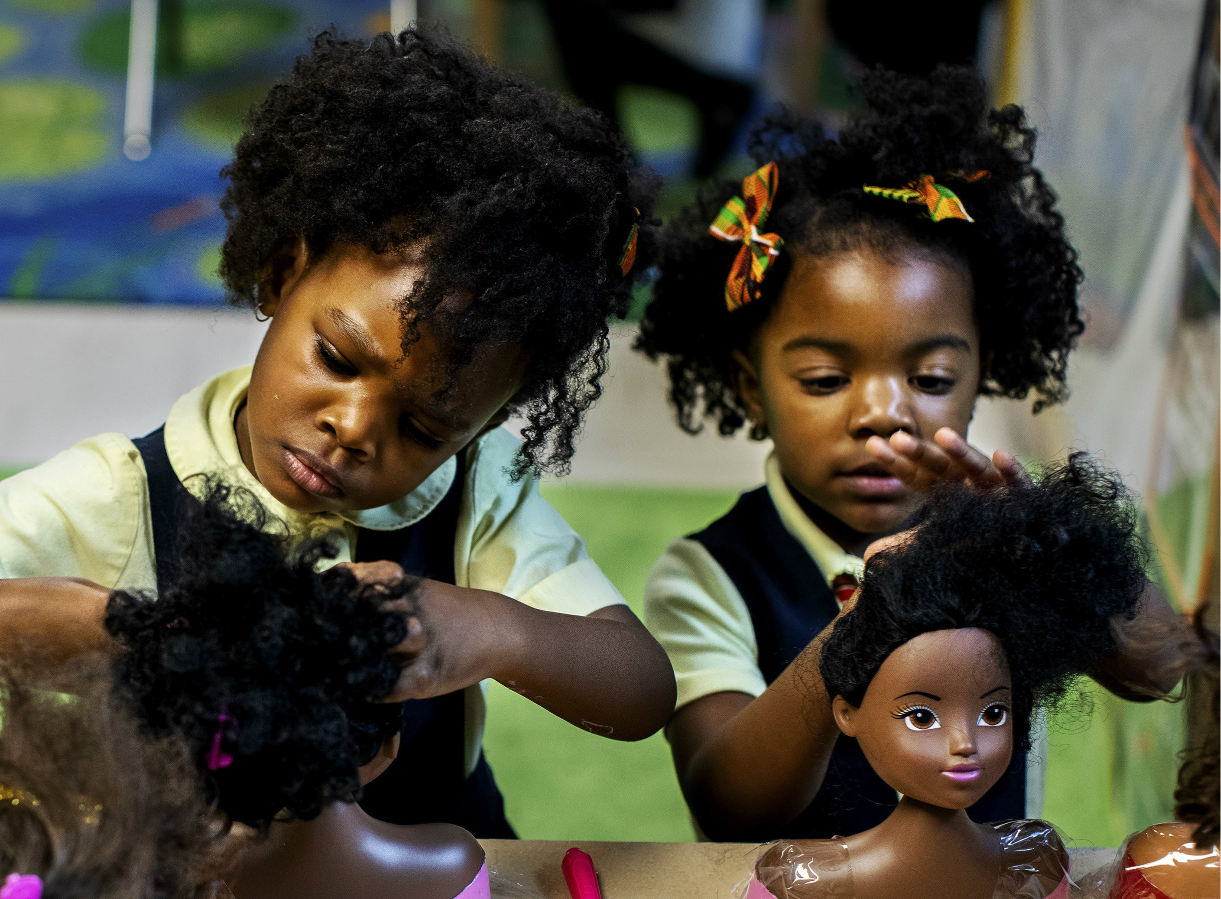 Preschoolers play with dolls at Little Sun People, a private preschool in Brooklyn. 
