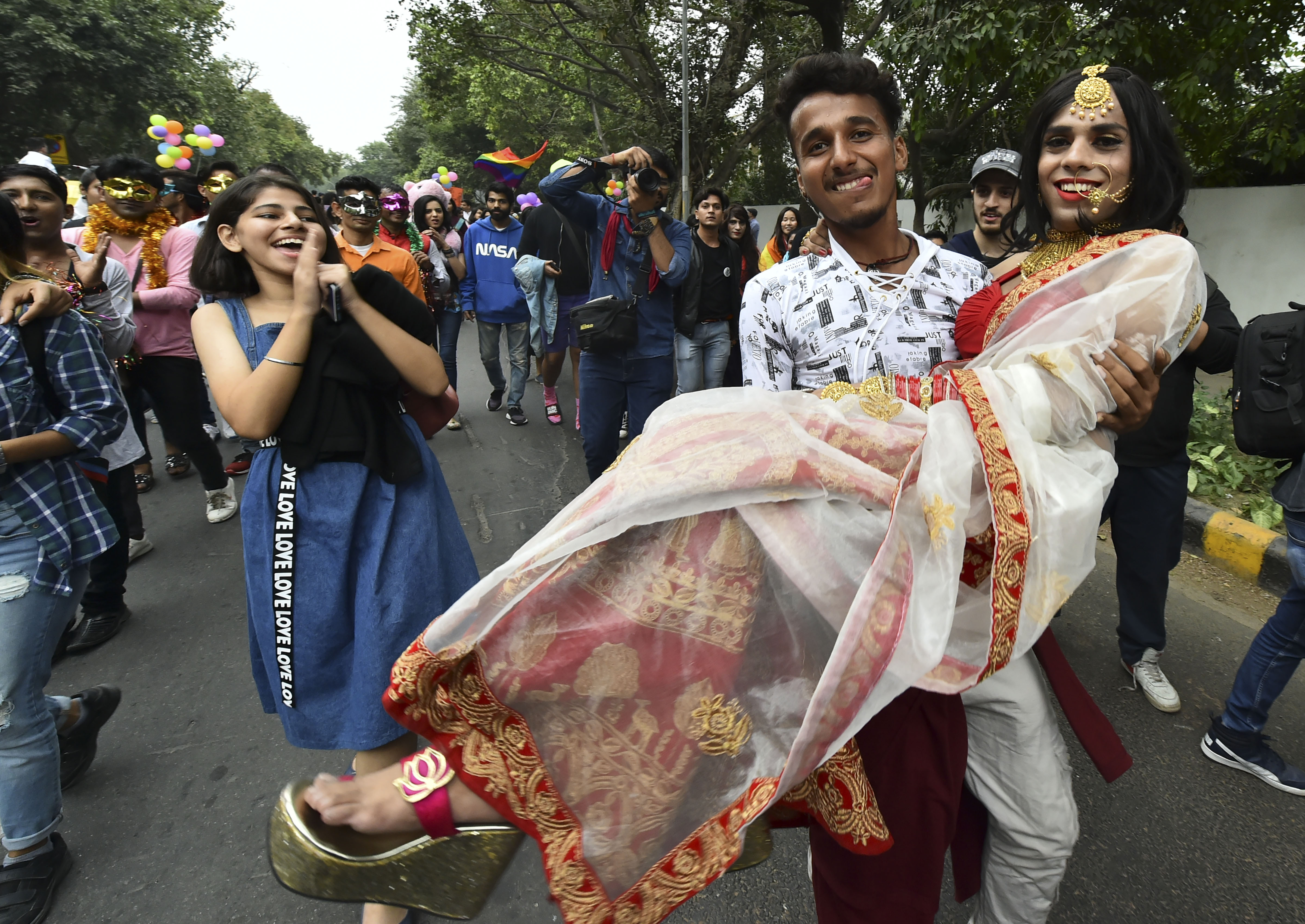 Members of the LGBTQ community and their supporters march during the annual Delhi Queer Pride Parade in New Delhi on Sunday, November 24, 2019.
