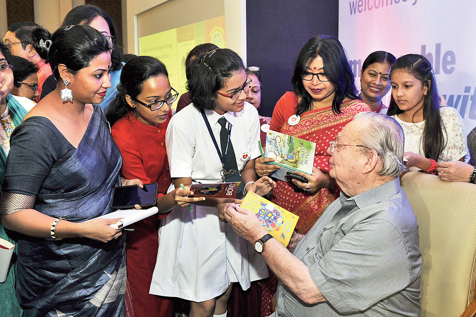 Ruskin Bond with students and teachers at a city hotel on Saturday.