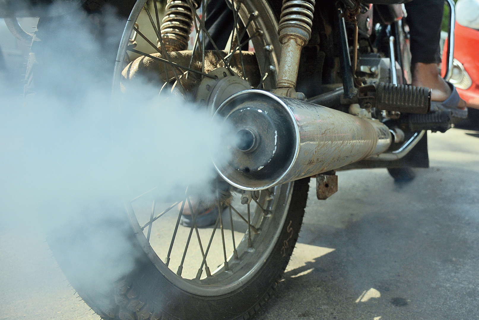 Alarming: A motorcycle emits smoke in Bhubaneswar. 