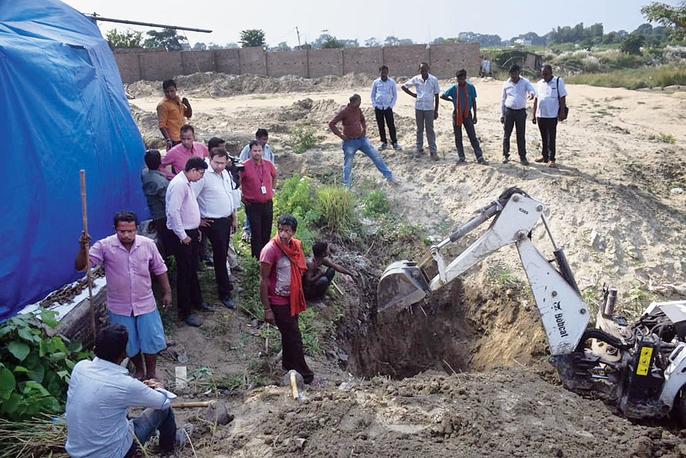 The CBI digging up the cremation site close to the Muzaffarpur shelter home on Wednesday