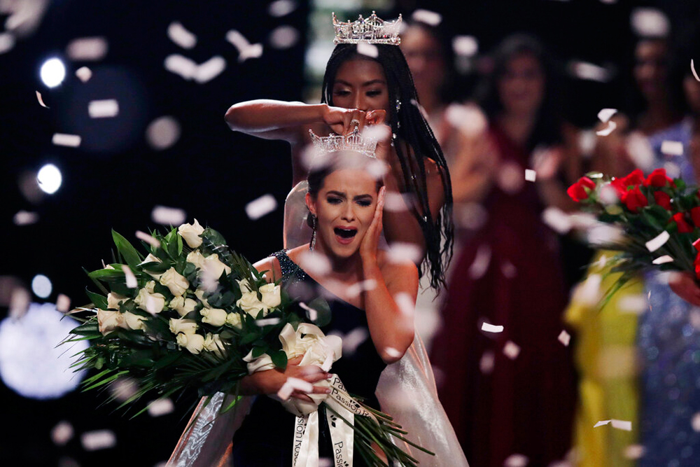 Camille Schrier reacts after winning the Miss America competition in Uncasville, Connecticut, on December 19