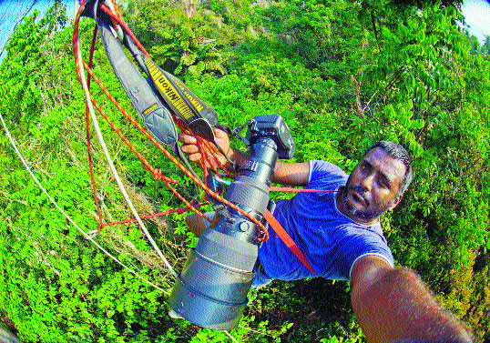 Mukherjee prepares to capture hornbills on Narcondam Island in the Andamans