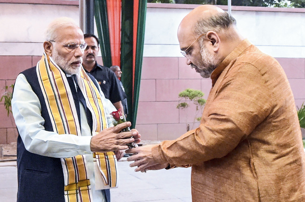 Modi being welcomed by BJP chief Amit Shah to the  party’s central election committee meeting in New Delhi. 