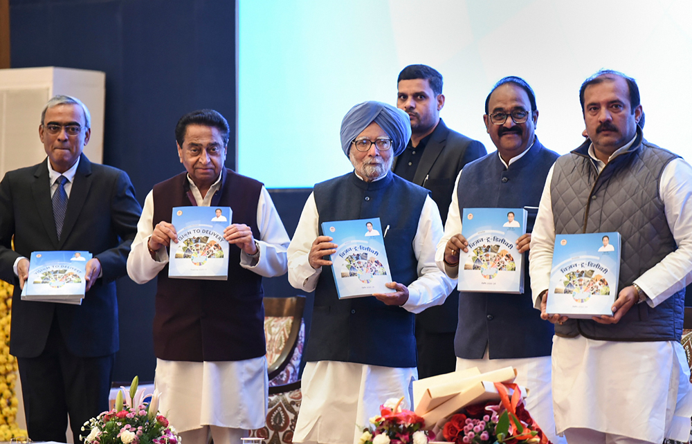 Former Prime Minister Manmohan Singh, as well as Madhya Pradesh chief minister Kamal Nath, releases Vision to Delivery Roadmap 2020-25 at an event to celebrate one year of the Congress government in the state in Bhopal on December 17
