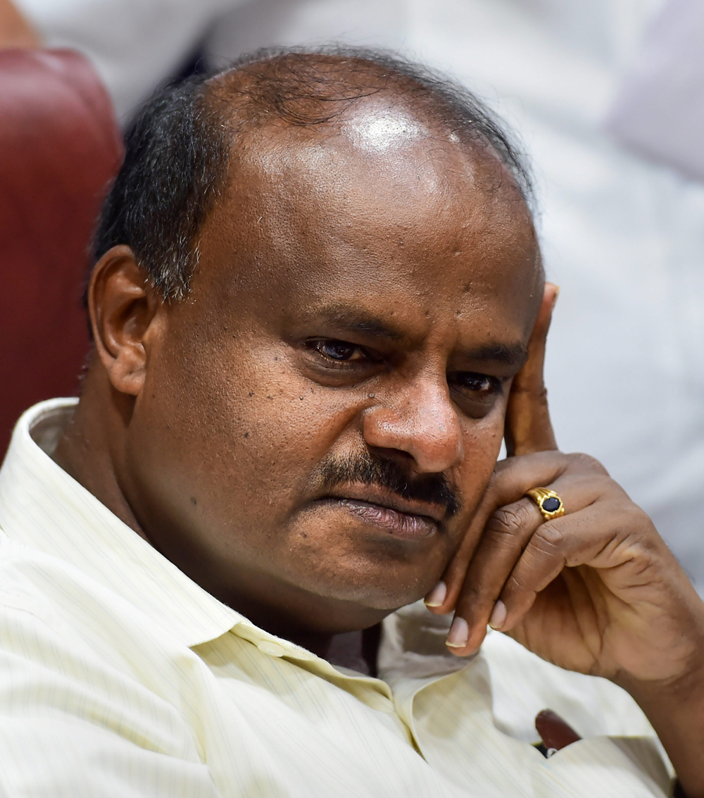 Karnataka Chief Minister H.D. Kumaraswamy looks on during a press conference after the cabinet meeting in Bangalore on Friday, May 24, 2019. 