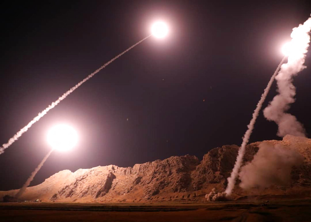In this photo released on Monday by the Iranian Revolutionary Guard, missiles are fired from the city of Kermanshah in western Iran targeting the Islamic State group in Syria.