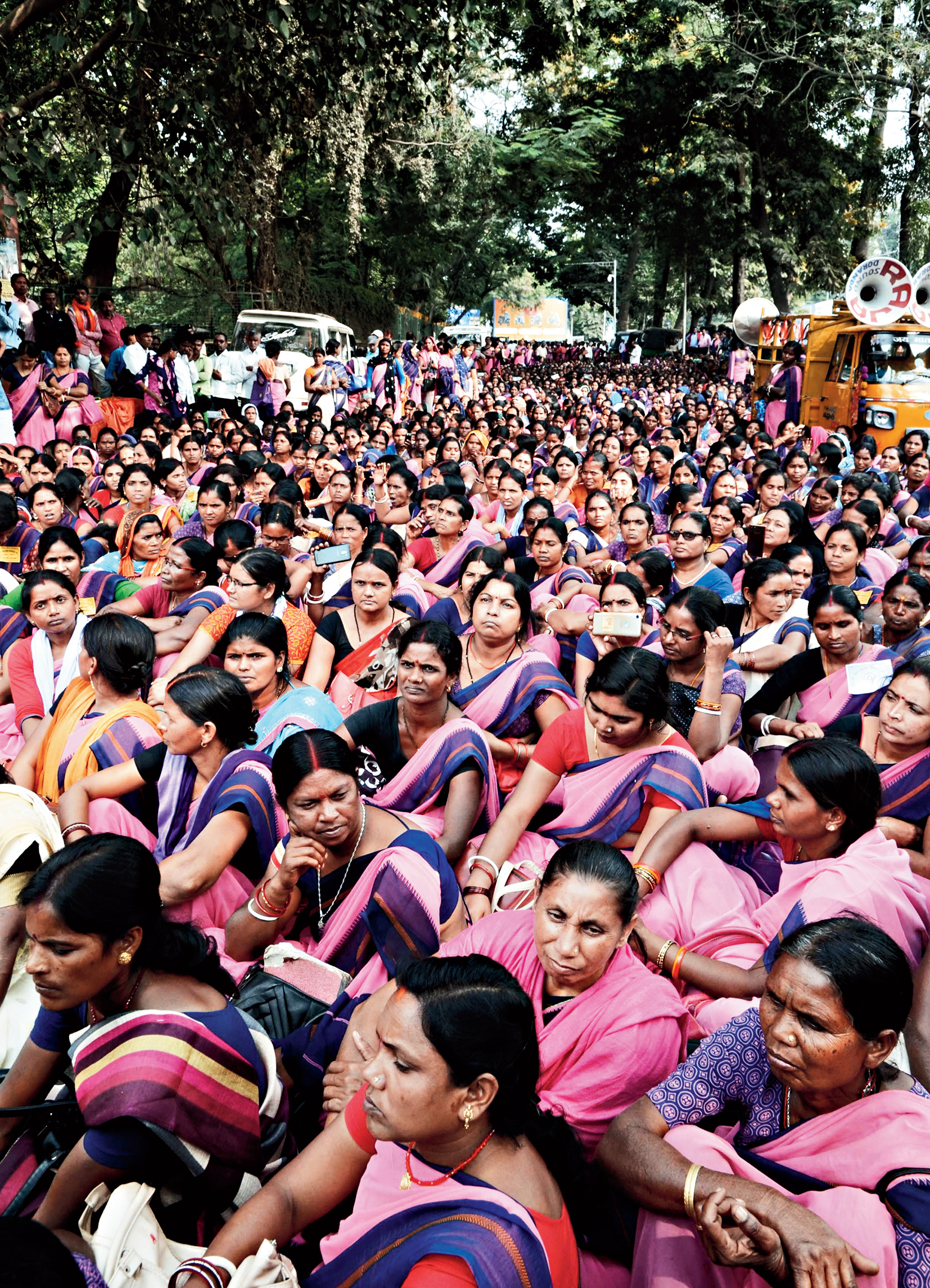 Anganwadi workers protest near Raj Bhavan for regularisation of their services.