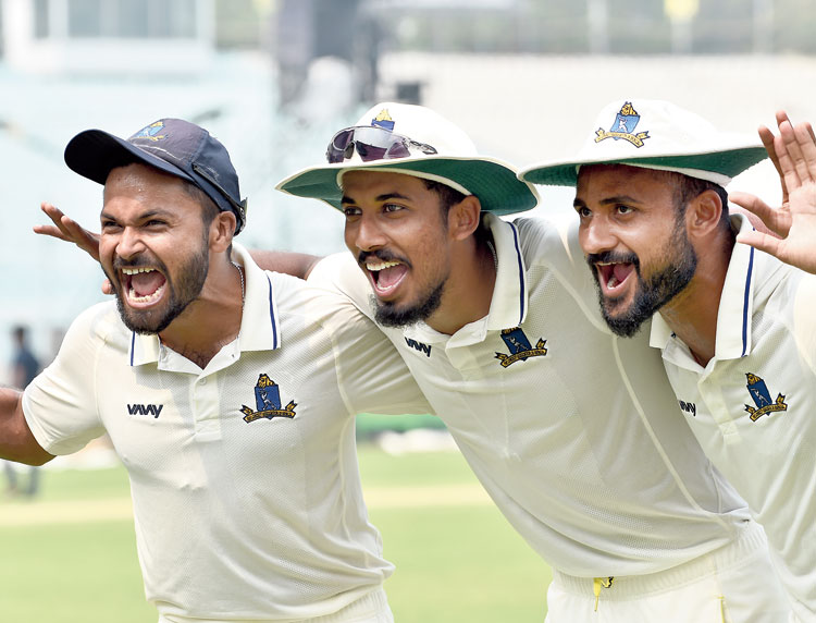 (From left) Bengal pacers Mukesh Kumar, Ishan Porel and Akash Deep celebrate Bengal’s win at the Eden on Tuesday, March 3, 2020.
