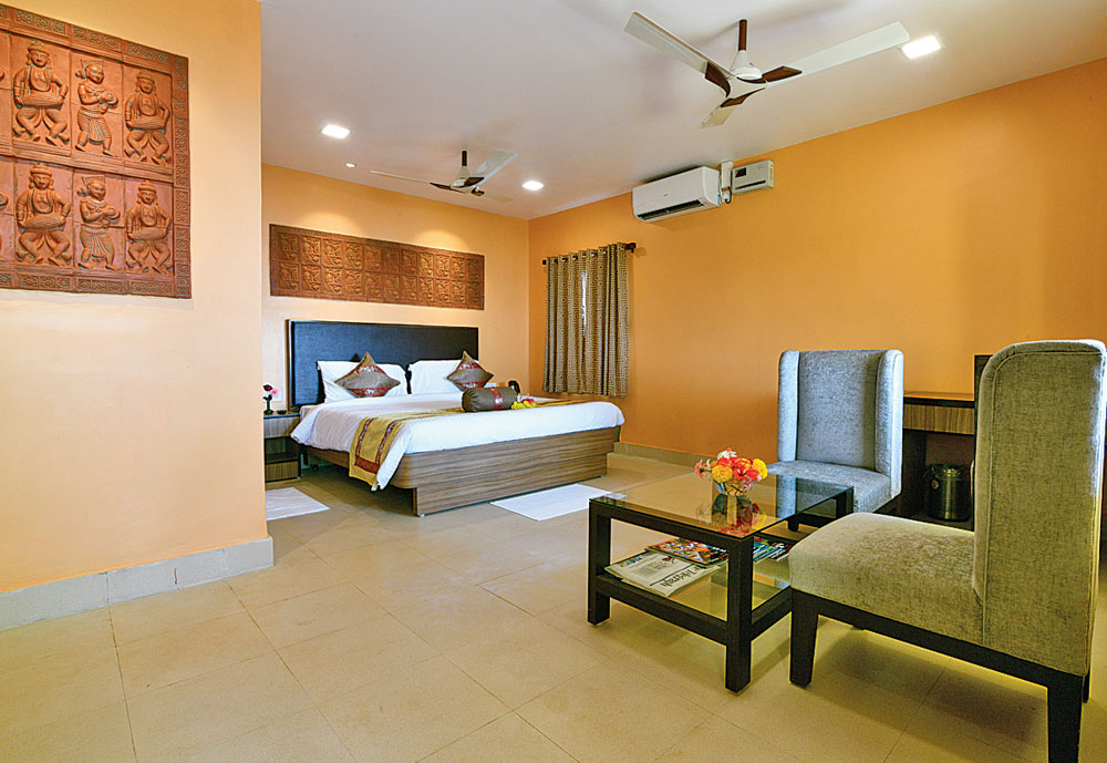 The spacious rooms offer a view of the lake or the garden from the windows.