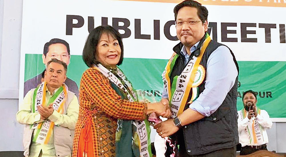 Former BJP MP Kim Gangte with Meghalaya chief minister Conrad K. Sangma at Churachandpur on Friday after joining the NPP