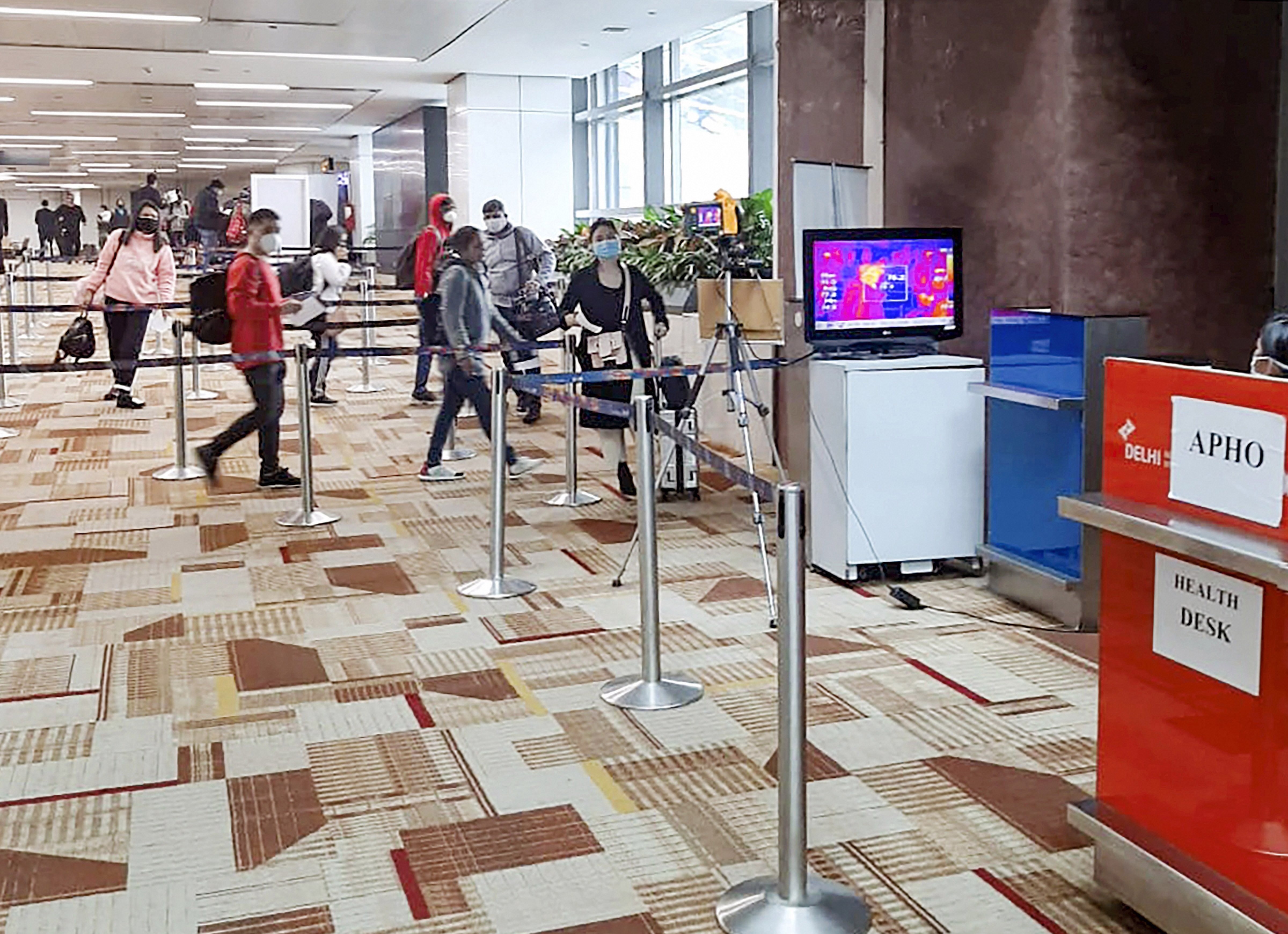  A thermal screening device checks passengers arriving in India from China in view of the coronavirus (CoV) outbreak, at Delhi International airport. 