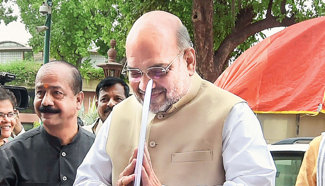 Amit Shah arrives in Parliament on Wednesday. 