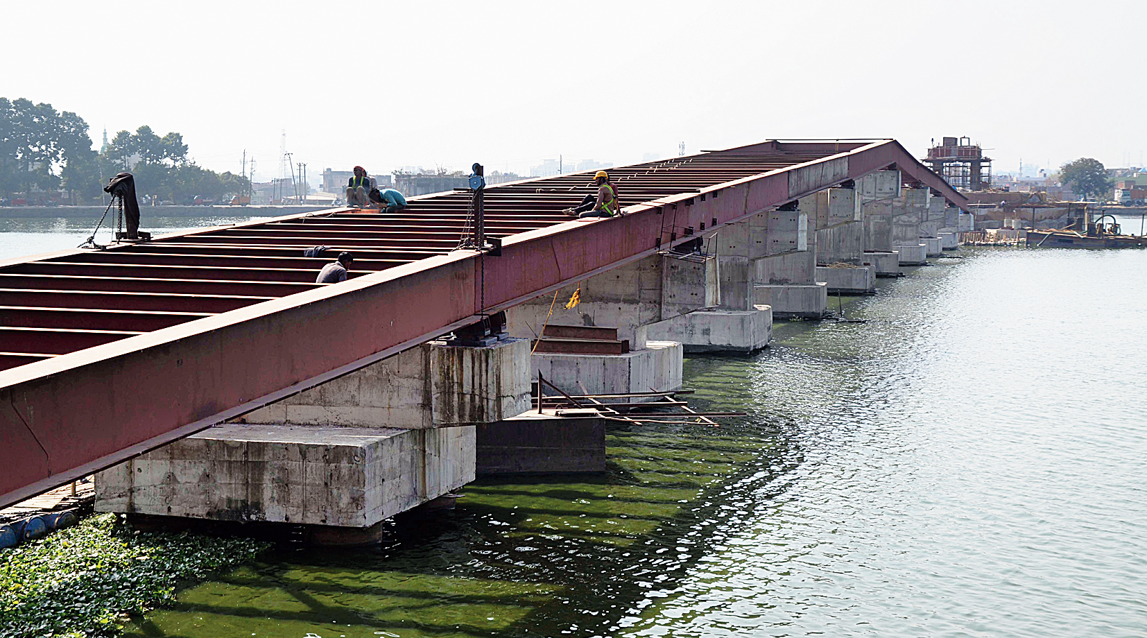 Wait over: A bridge that leads to the islet on Ranchi Lake under construction on Friday. 
