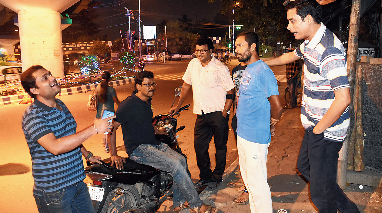 Club members discuss their upcoming trek under the Chingrihata flyover.