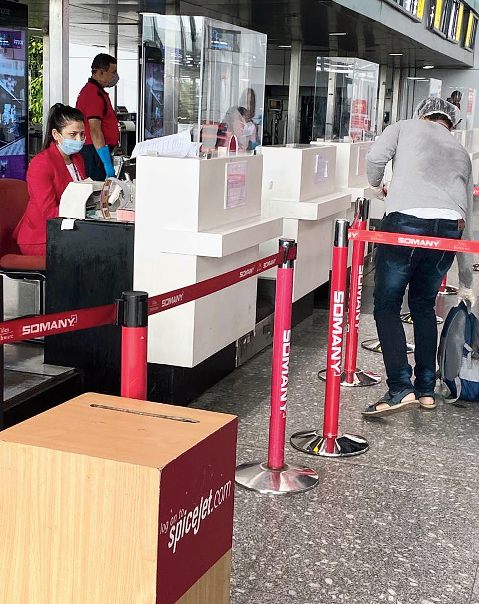 Glass shields are a new addition at check-in counters