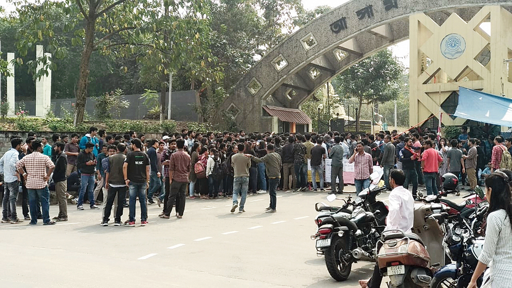 Students gather outside Assam University