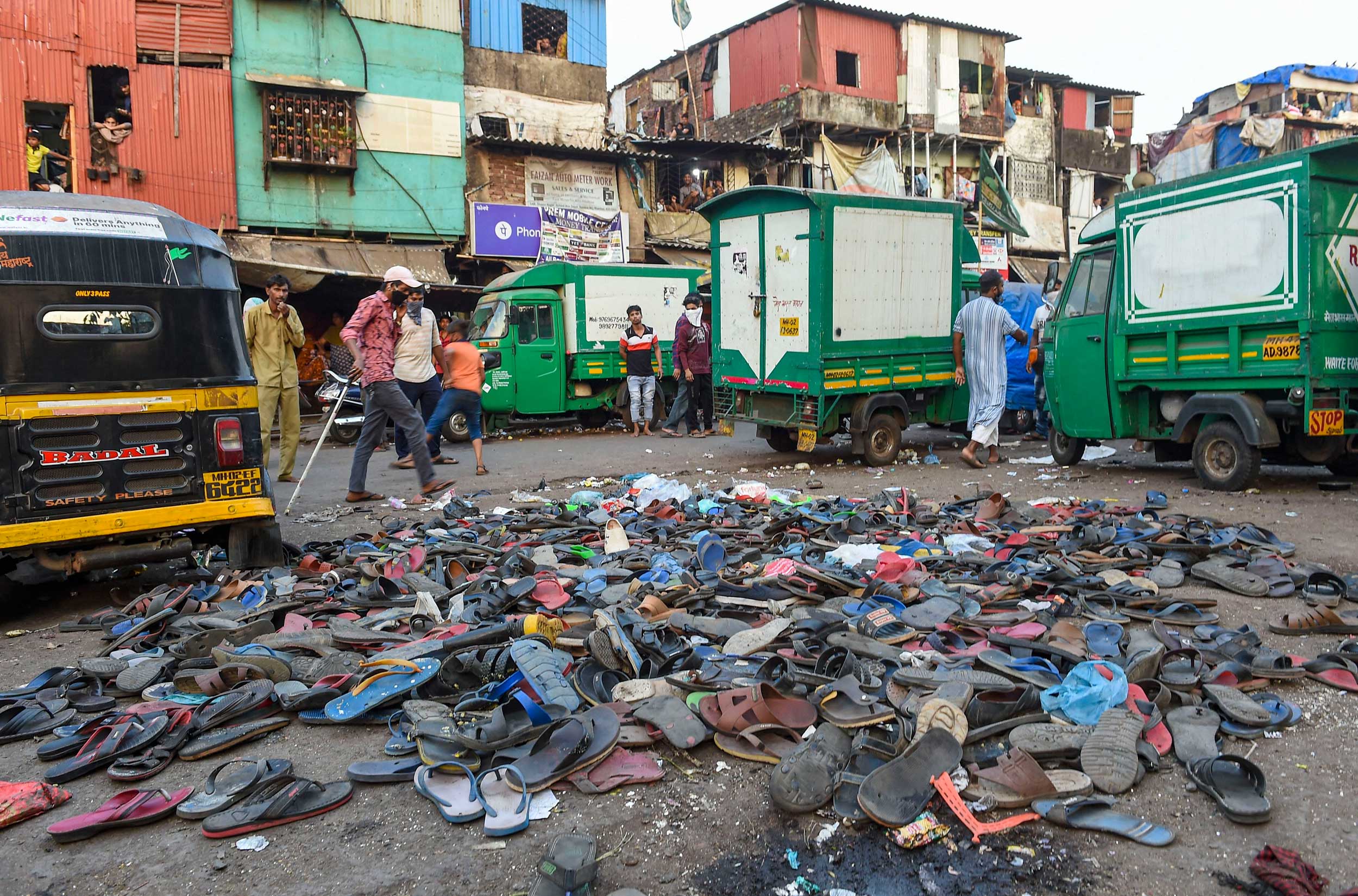 Footwear left behind outside the Bandra railway station in Mumbai after police dispersed a crowd of migrants on Tuesday during the extended lockdown. 
