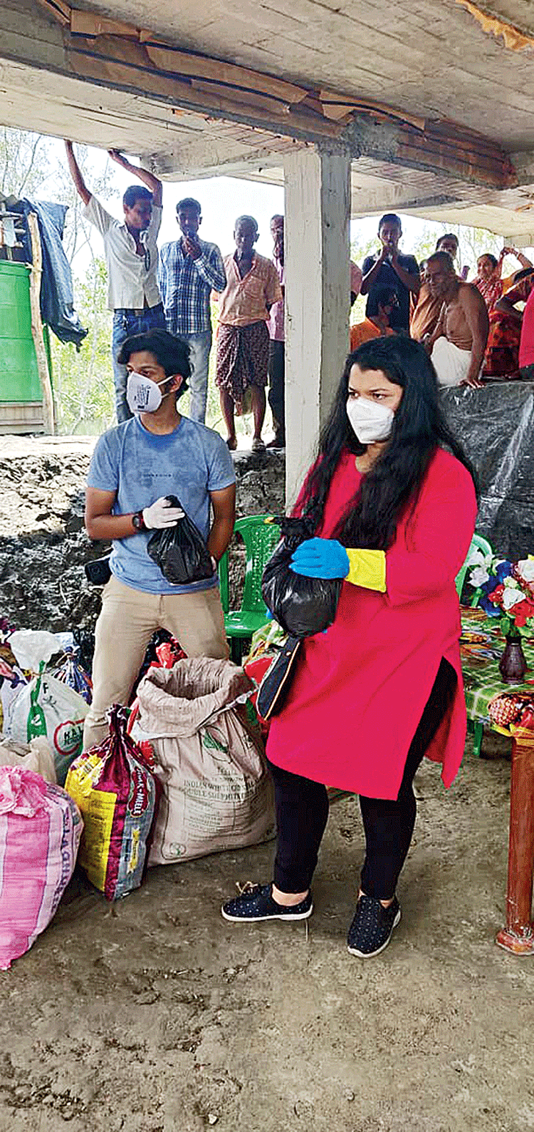 Student initiative: Villagers line up for the kits