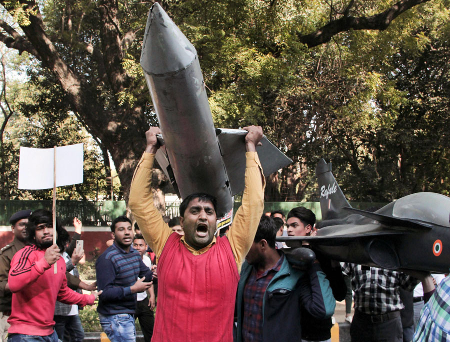 Youth Congress activists protest against the government's disclosure that Rafale files are missing, near defence minister Nirmala Sitharaman's residence, in New Delhi on Thursday, March 7. 