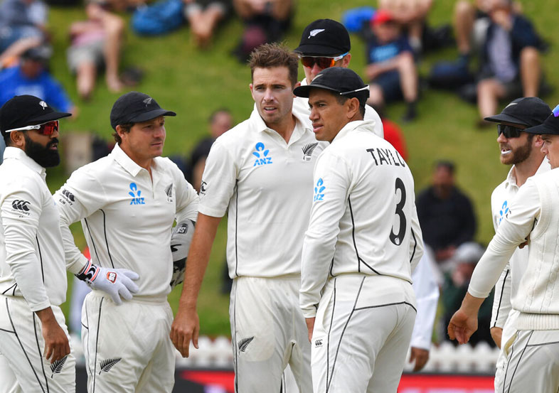 Tim Southee (centre) is congratulated by teammates after dismissing India's Prithvi Shaw in Wellington on Friday