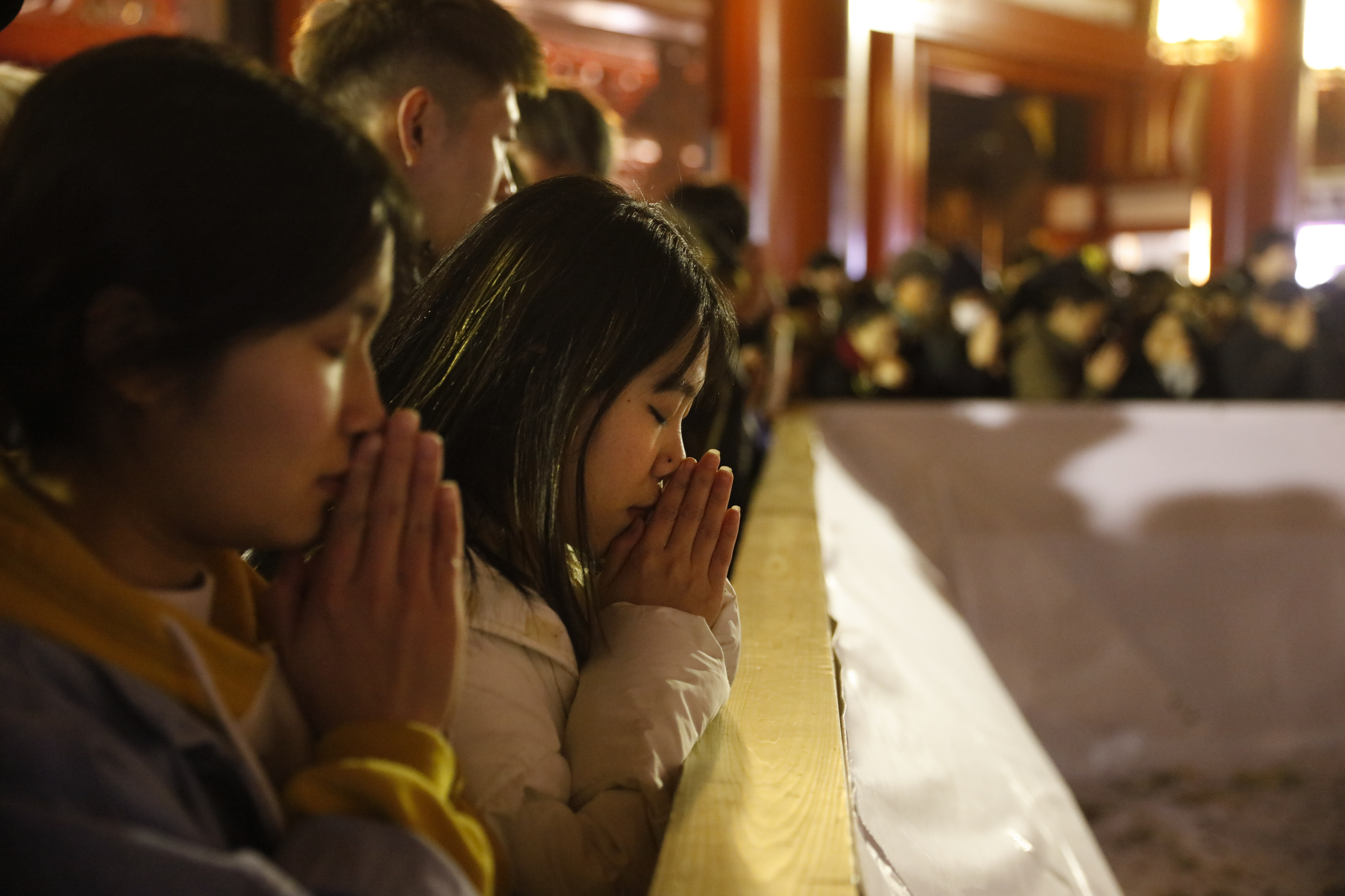 People pray at Sensoji temple as part of the New Year's celebration on January 1, 2020, in Tokyo