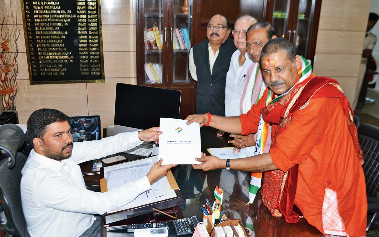 Kirti Azad files his nomination at district collectorate in Dhanbad on Saturday. 
