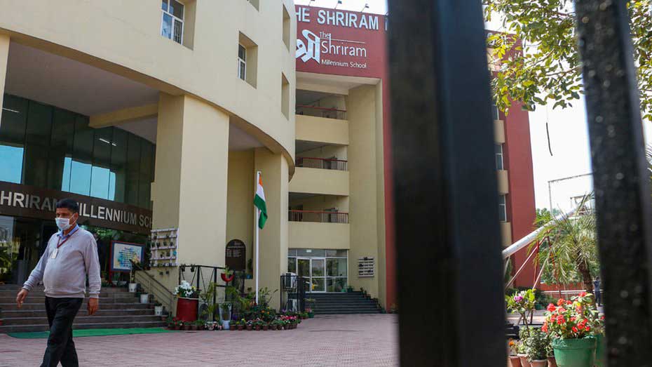 A staff member of Shriram Millennium School in Noida on Tuesday
