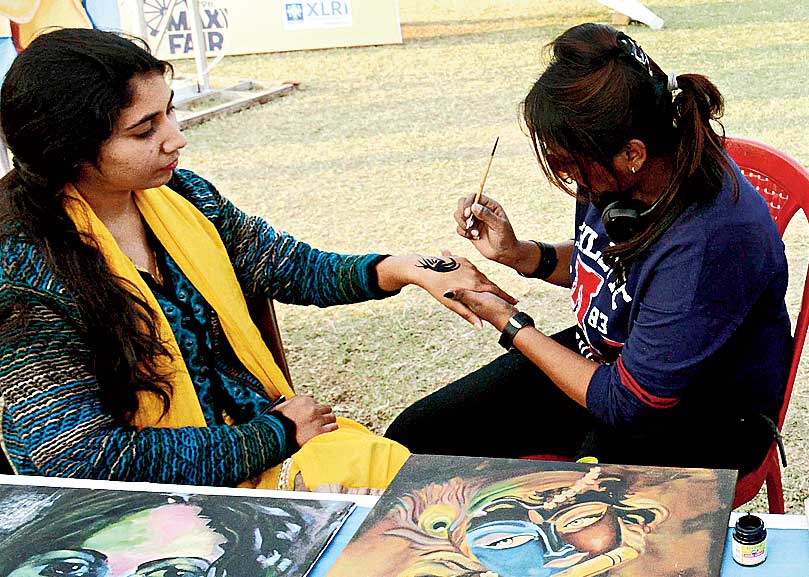 Students paint tattoos at Maxi Fair in XLRI in January this year 
