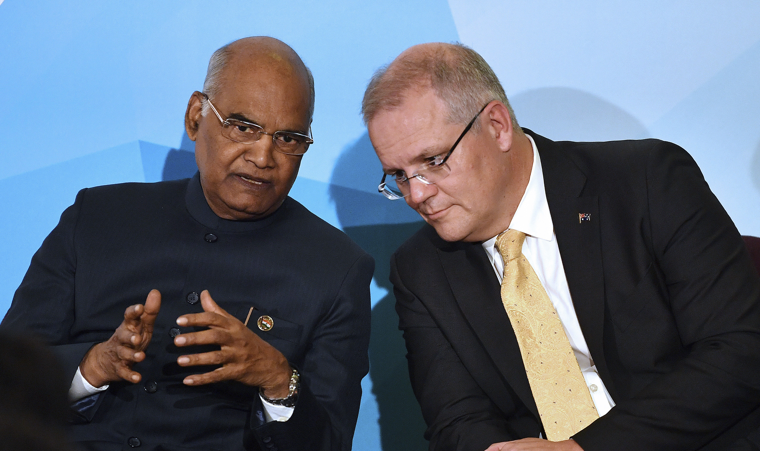 India's President Ram Nath Kovind (left) talks to Australia's Prime Minister Scott Morrison at a business summit in Sydney, on Thursday.