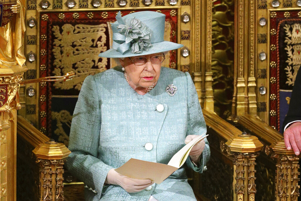 Britain's Queen Elizabeth II delivers the Queen's Speech, in the chamber ahead of the State Opening of Parliament, in the House of Lords, in London, on December 19, 2019.