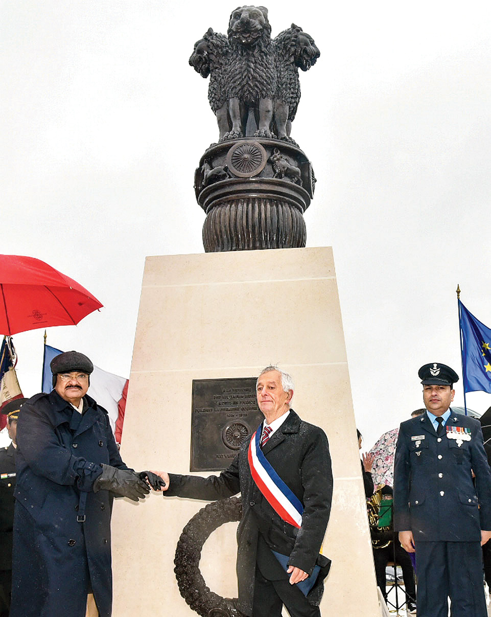 Vice President M. Venkaiah Naidu (left) shakes hands with Gerard Allart, mayor of Villers Guislain, France, after inaugurating the Indian war memorial there on Saturday, November 10
