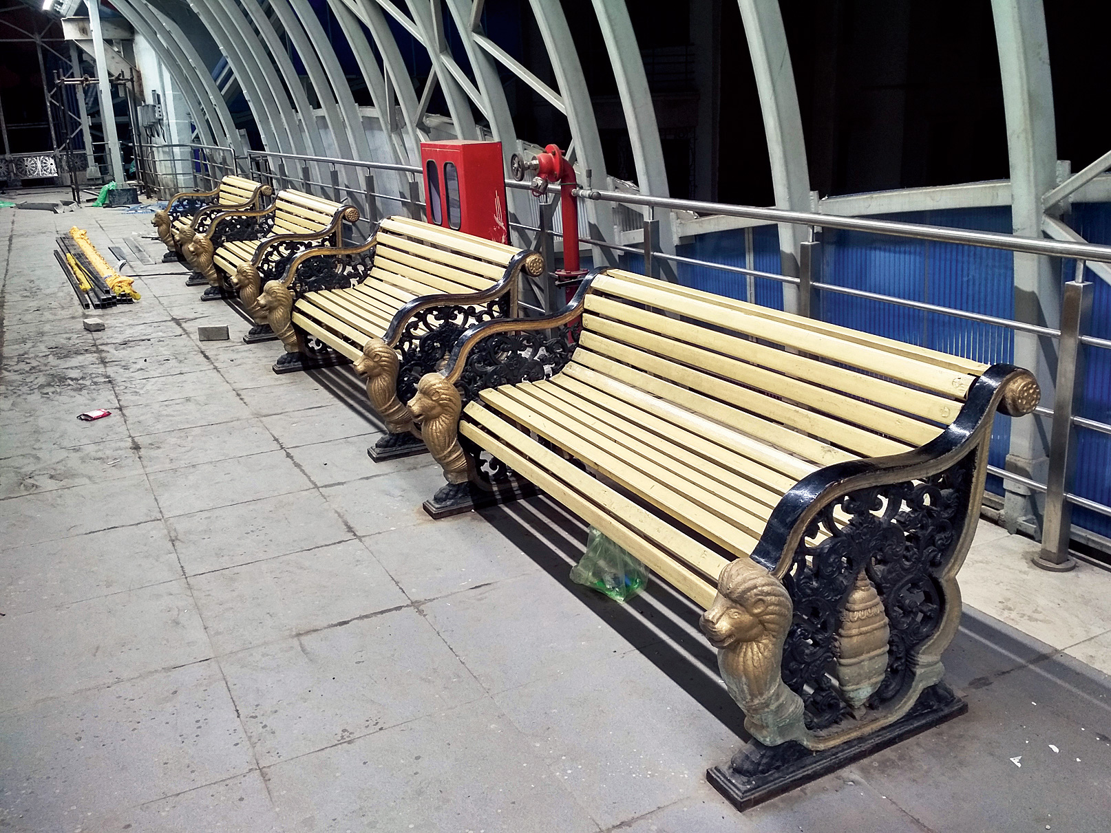 Benches for travellers inside the skywalk.