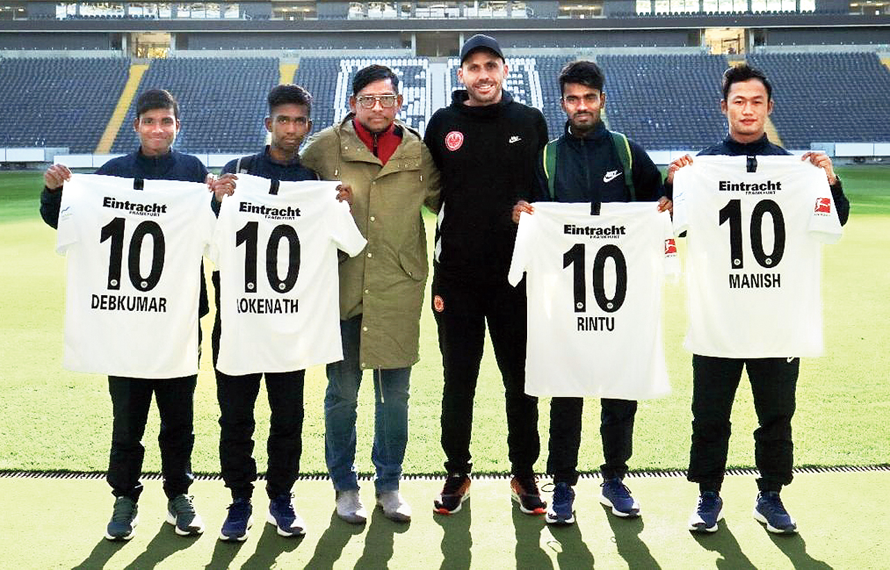 The four footballers from Bengal pose with their Number 10 jerseys in Frankfurt. Kaushik Moulik (third from left) is also with them.