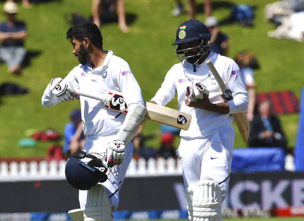 Jasprit Bumrah, left, and Mohammed Shami walk from the field after India was dismissed for 191 runs in their second innings during the Test between India and New Zealand at the Basin Reserve in Wellington, New Zealand, Monday, February 24, 2020