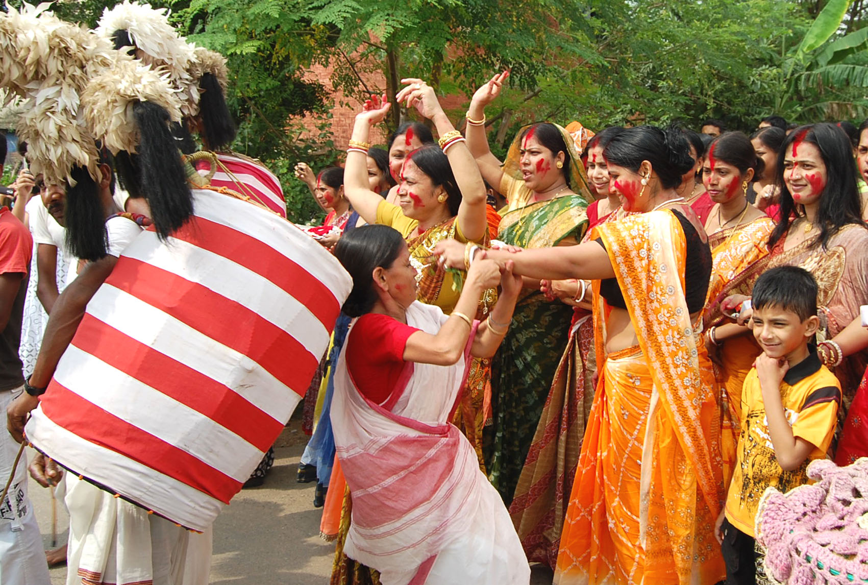 A file picture of women dancing on way to the visarjan ghat on Vijaya Dashami 