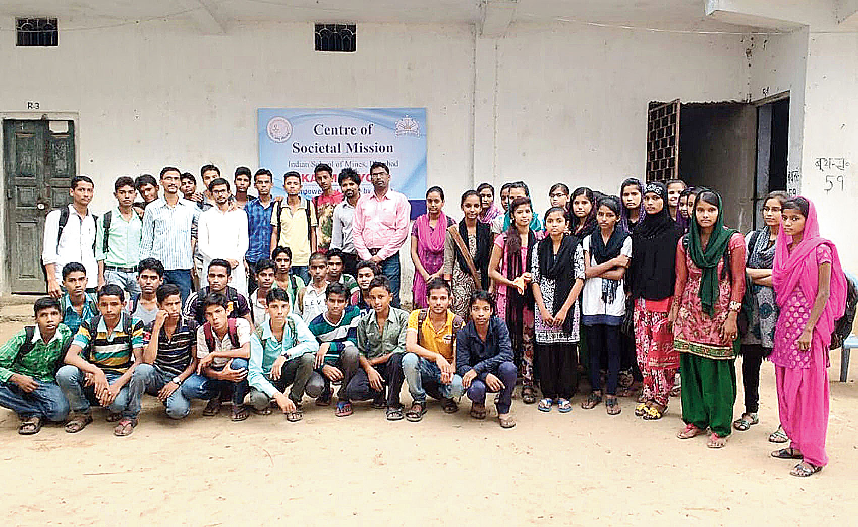 Mentors of Karm Jyoti with the students at a school in Wasseypur, Dhanbad, last week. 
